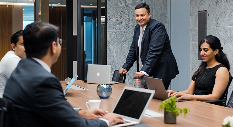 Professionals collaborating in a Bengaluru serviced office