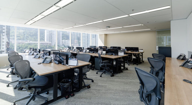 Premium office unit at the TEC Centre in 2 Pacific Place, Hong Kong, featuring modern furnishings, ample natural light, and a professional workspace environment