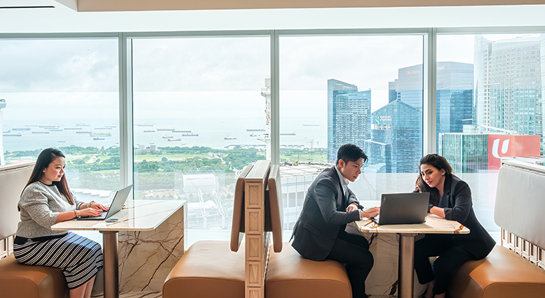 Executive discussing strategies in a Coworking Meeting Room in Singapore CBD